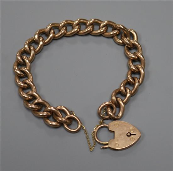 A 9ct gold curb link bracelet.